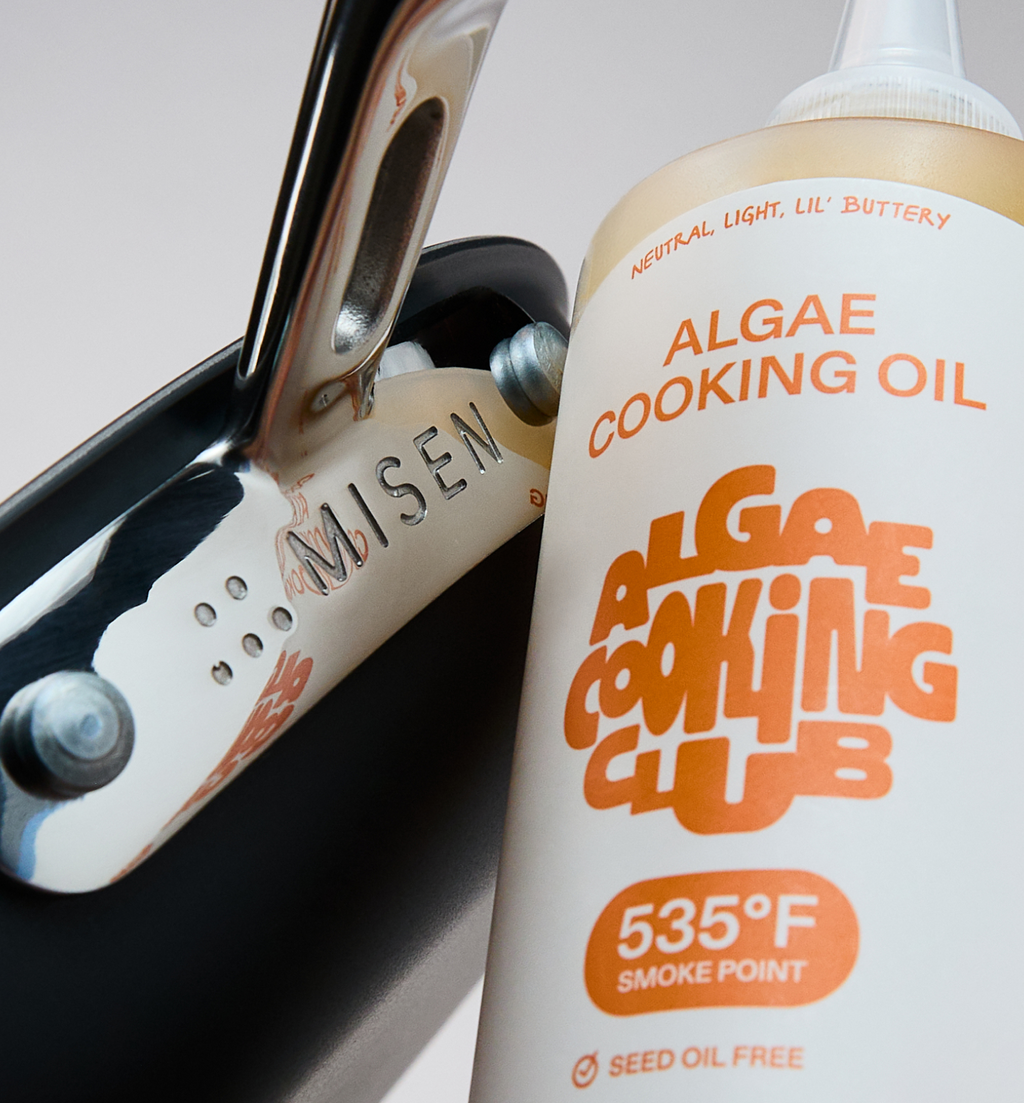 Algae Cooking Club algae cooking oil with 535°F smoke point beside a Misen pan