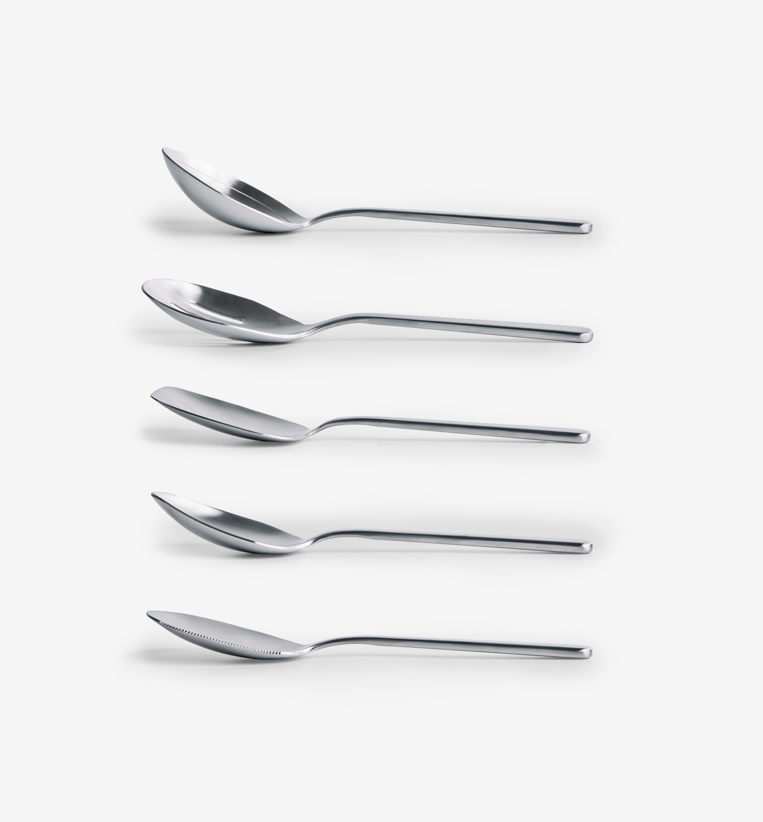 Stainless steel designer cutlery set with five spoons and knife in modern minimalist style